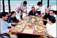 SEAFOOD TABLE FOR SEVEN: At the Caravella, from left, Dr. Subodh Kerkar, Dr. Sonia Pinto de Rosario, former chief minister, Dr. Willy DSouza, Lucio Miranda at the head of the table, Mrs. Grace DSouza, Dr. Sidney Pinto de Rosario and Dr. Savita Kerkar.