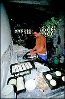 Flour-covered walls of the Old Church Bakery with baker Ignatius DSouza joyfully working in it early one winter morning.