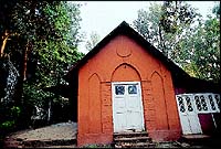 The Old Church Bakery still resembles the church it was until 1912, and the blessings from this house of worship have come to the happy baker and his family.