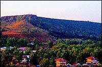 View of the Table Land plateau from Sydney Point. On the left, is the lodging and boarding quarters of Dawn Academy. Inset, students of Billimoria, New Era, St. Peters, Codesh and Green Valley schools get together at the slopes of Sydney Point overlooking the Krishna River.