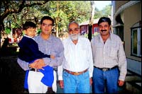 Ramnikbhai P. Tejani, the second generation looking after Dreamland, flanked by his sons Manish and Kailash. The fourth generation in arms... being readied to take over.