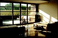 Comfortable wood and stone cabins  with 
an accent on environment-friendly design overlook the sprawling Chateau Smith-Haut-Lafitte vineyards and make the experience relaxing and invigorating.