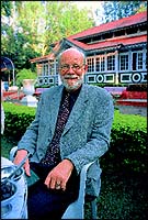 Arne Kittang of New Era High School sitting for tea on the lawns of the Il Palazzo Hotel.