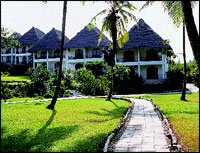 To the Makuti roofed rooms.