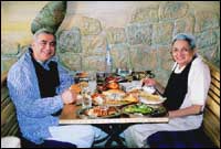 Behram Contractor,Ismail Merchant and a table groaning with seafood at Trishna.