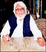 M. F. Husain is a regular at Samovar. Here he is sketching Madhuri Dixit for UpperCrust on a table.